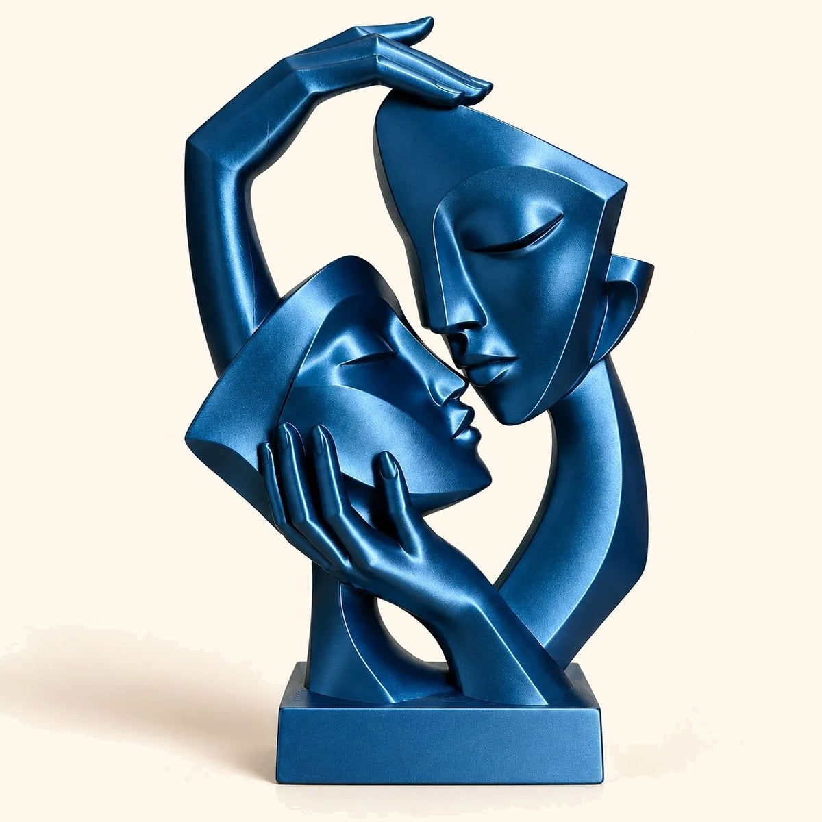 Abstract couple face sculpture in Titanium Blue finish