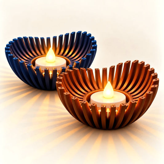 Sculptural tealight holders Signature Duo – Midnight Blue and Burnished Bronze with LED tealights